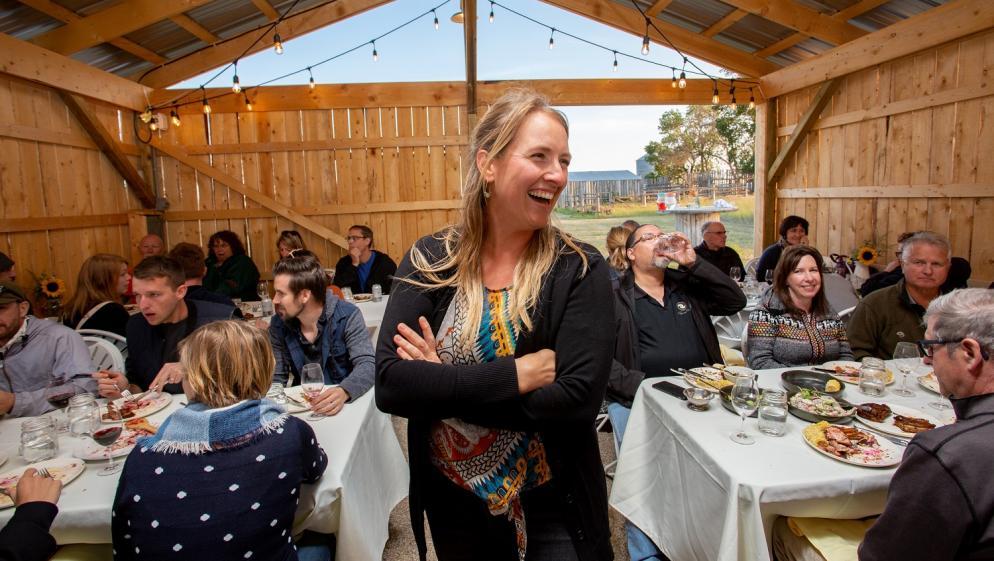 Diners enjoy a meal in a farmhouse