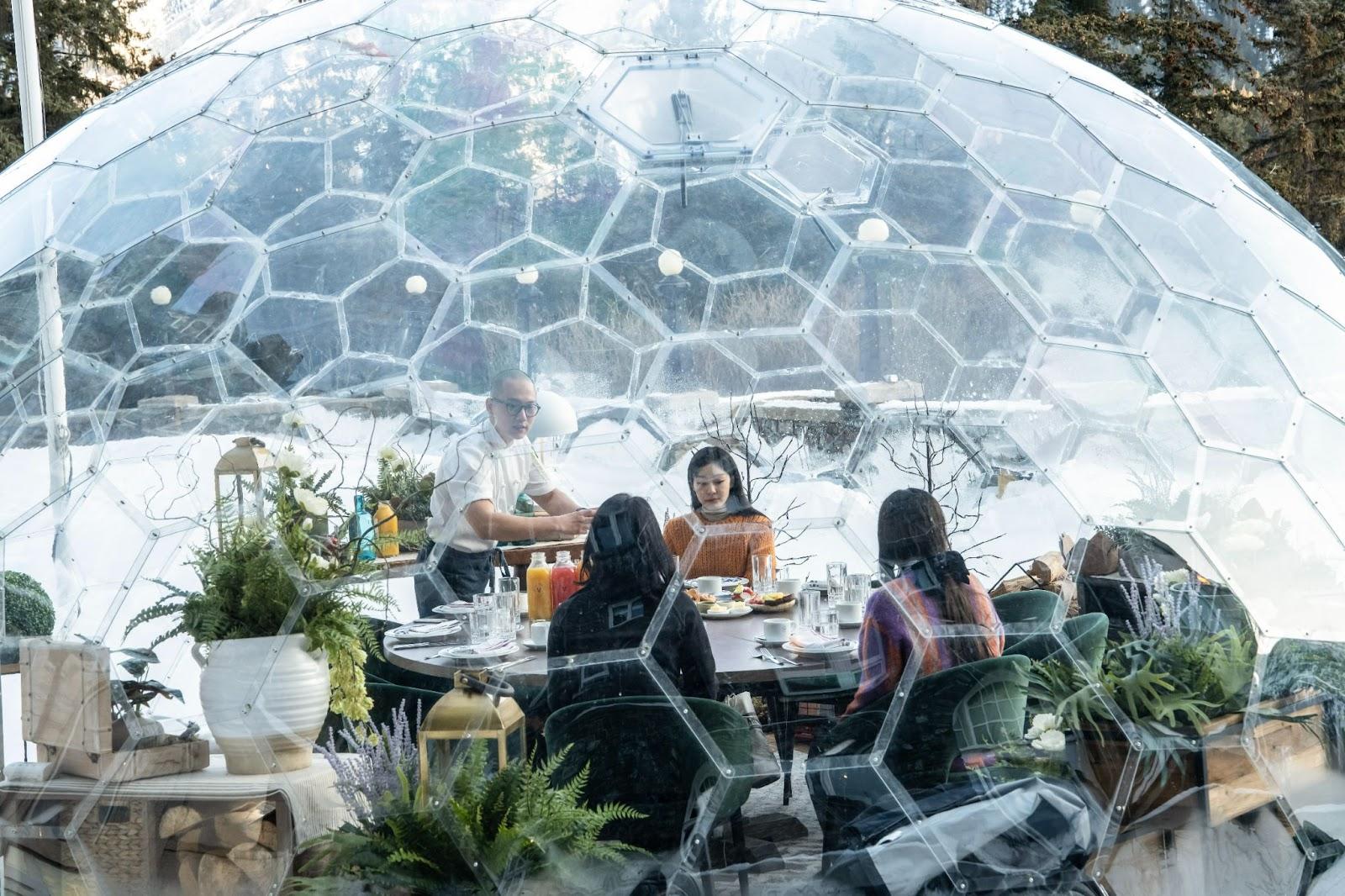 Yuna Kim dines outdoors within a geodesic dome