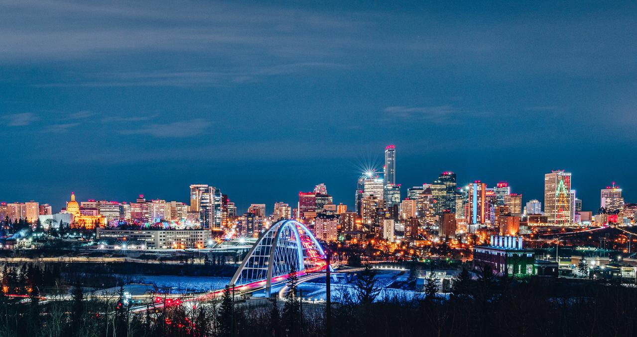 A view of the Edmonton cityscape at night.