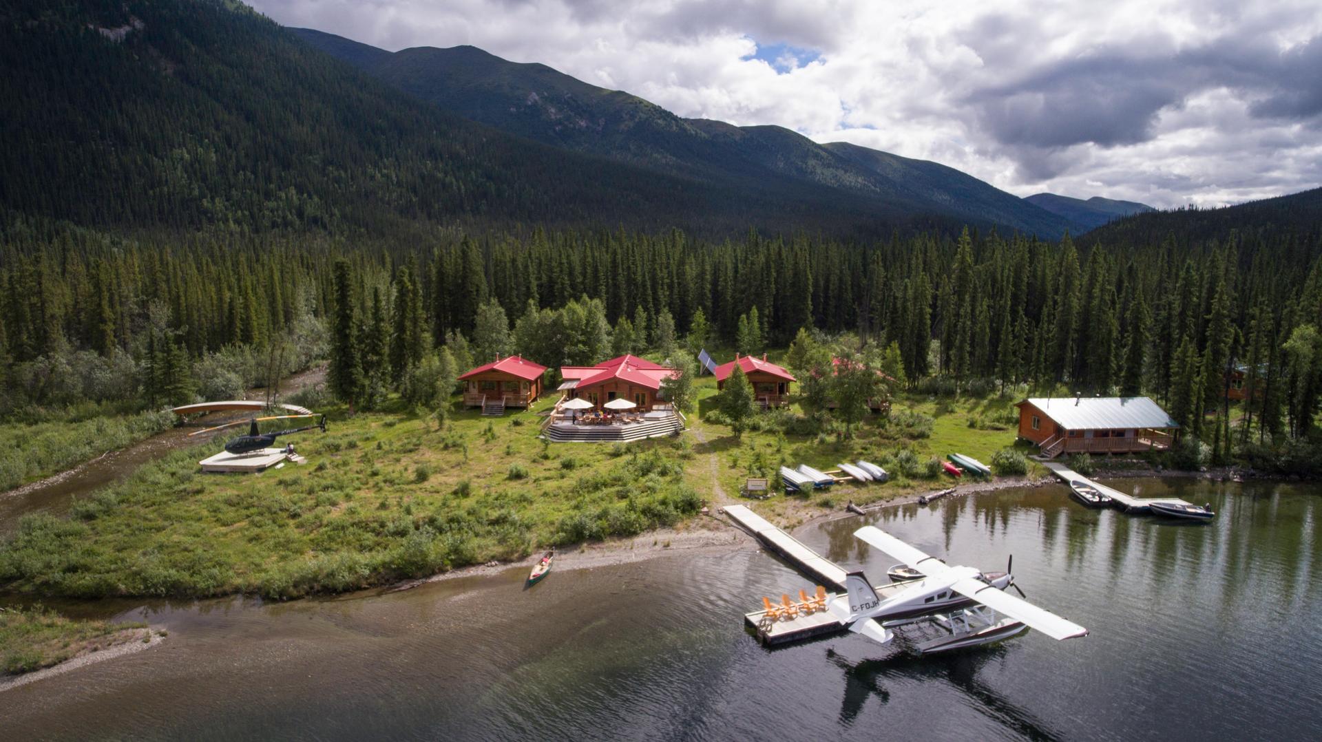 Floatplane docked on Tincup Lake at Tincup Wilderness Lodge in Yukon.