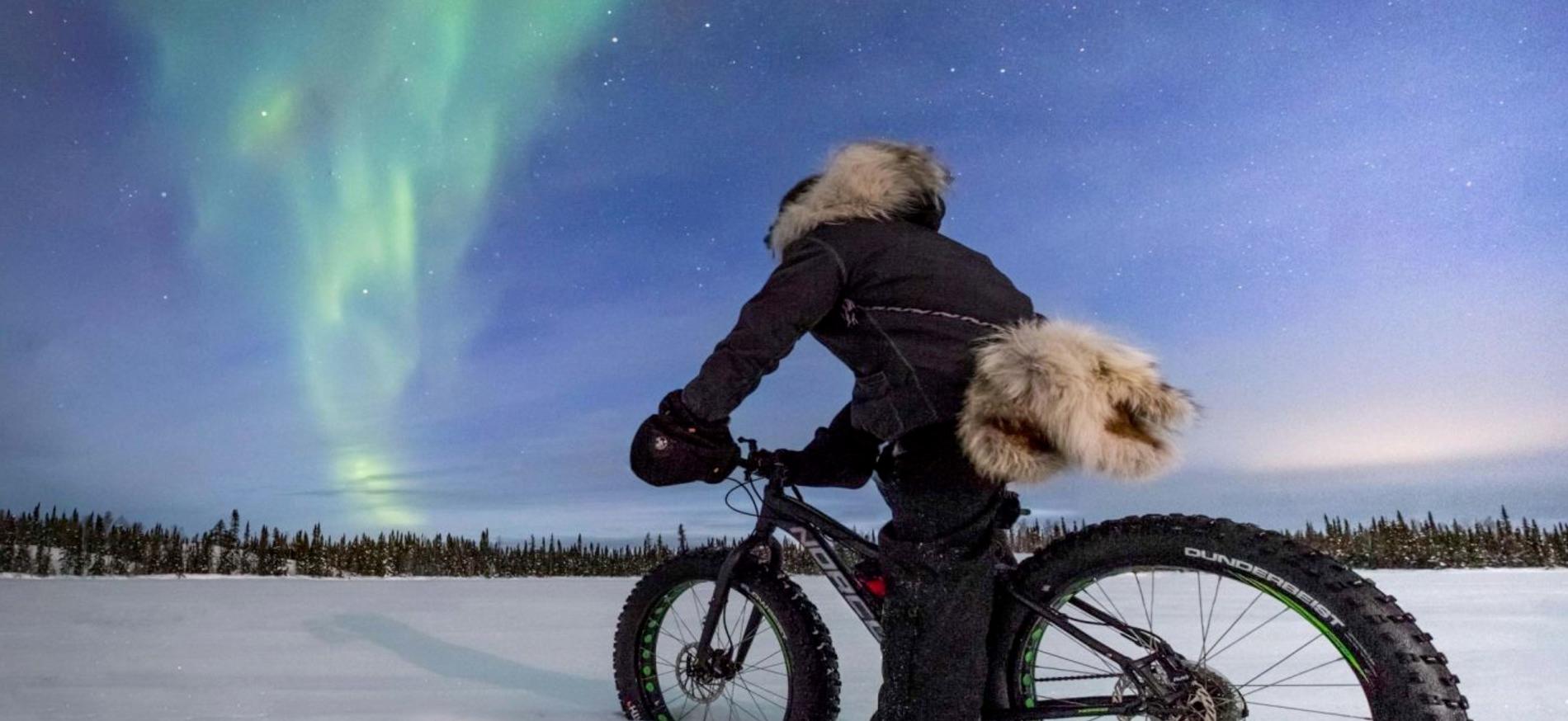 Fat biking under the aurora