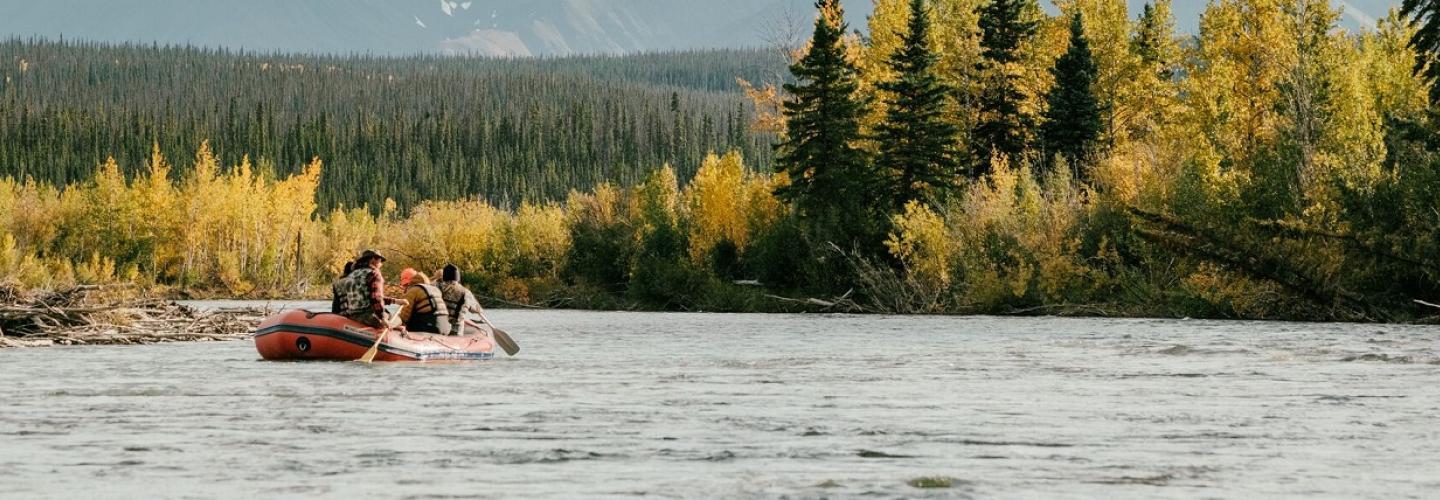 A group of men in a dinghy in Canada