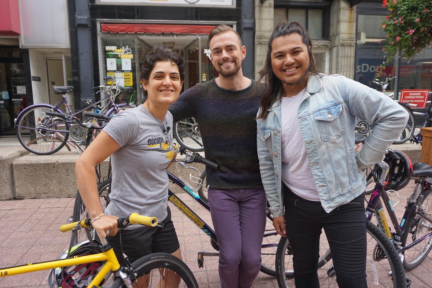 Brett and Cameron with a staff member of Escape Bicycles, outside the store