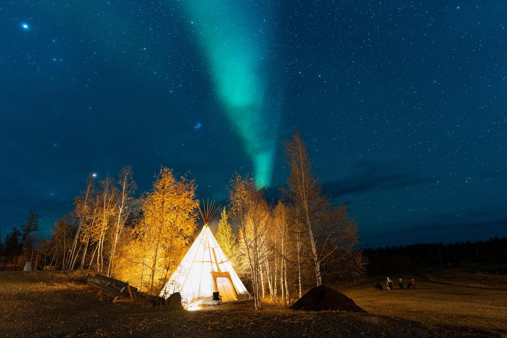 Teepee under the aurora borealis in the Northwest Territories
