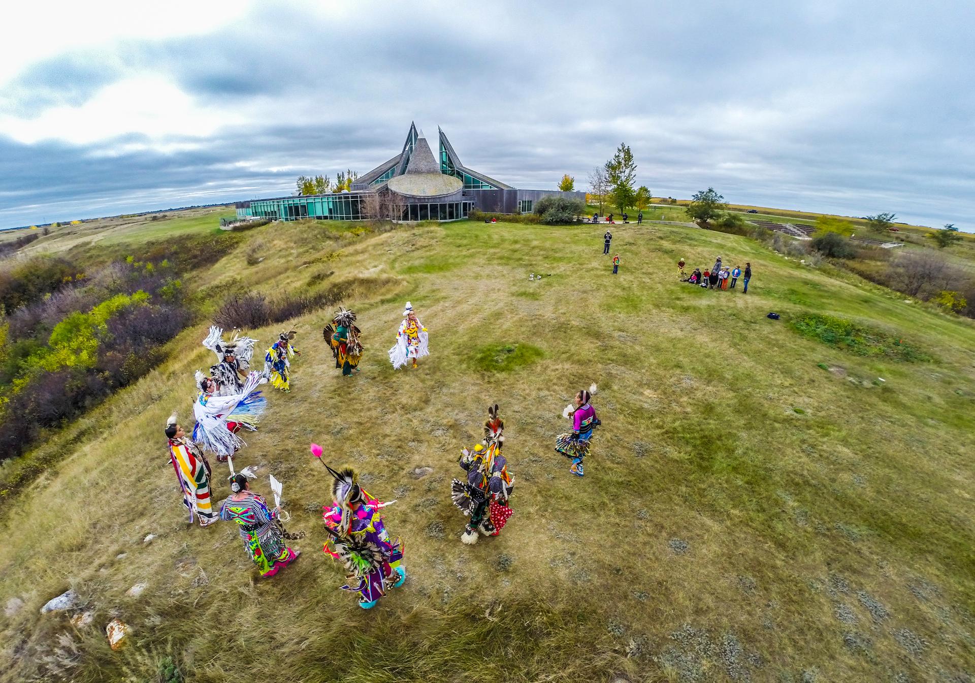 An aerial view of Indigenous leaders at Wanuskewin heritage park
