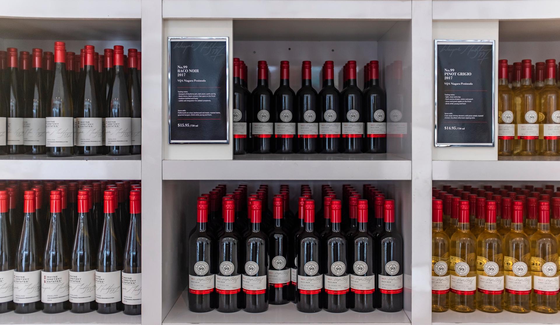 Shelves filled with bottles of wine from Wayne Gretzky Estates.