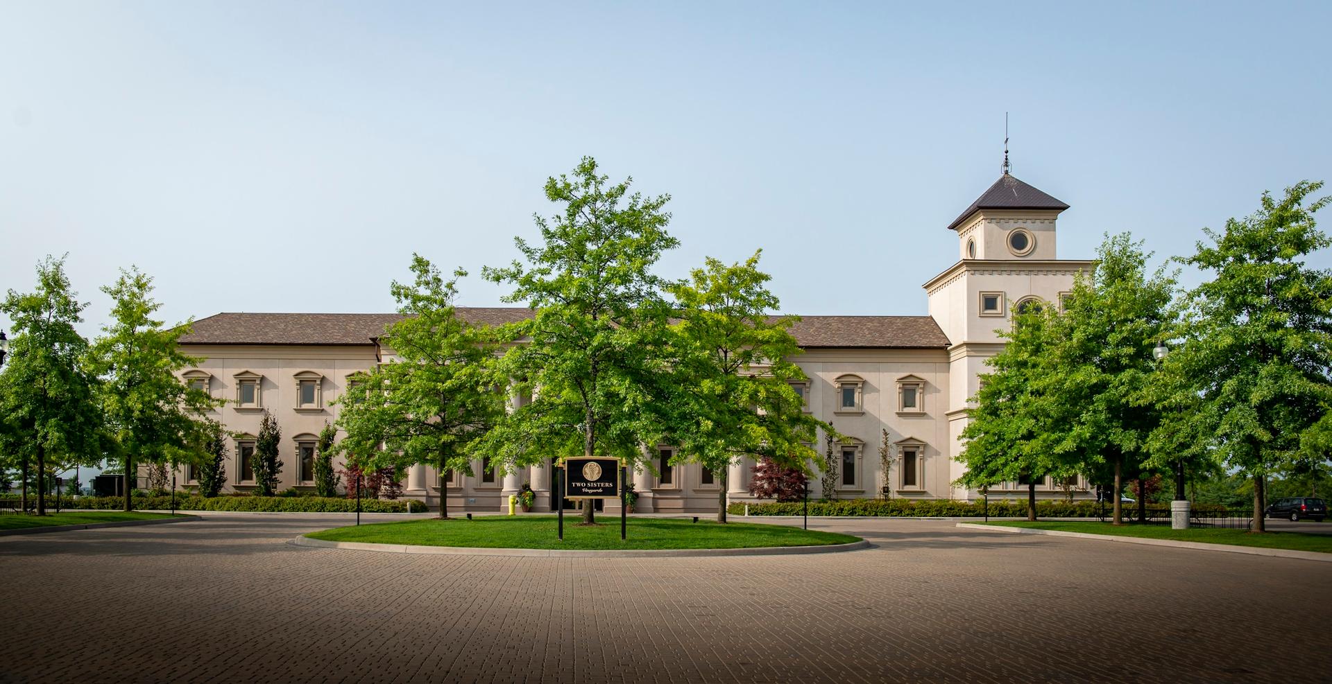 An exterior view of the main building at Two Sisters Vineyards.
