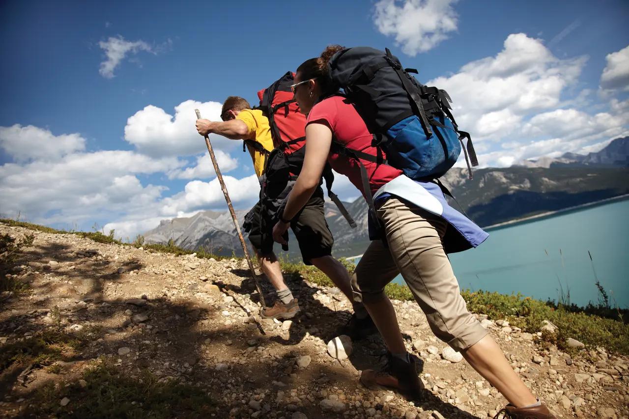 Hiking image used to connect ‘water theme’ to activity planning—trails that lead to lakes, waterfalls, and viewpoints—helping readers understand what ‘adventure’ means in practical itinerary terms.