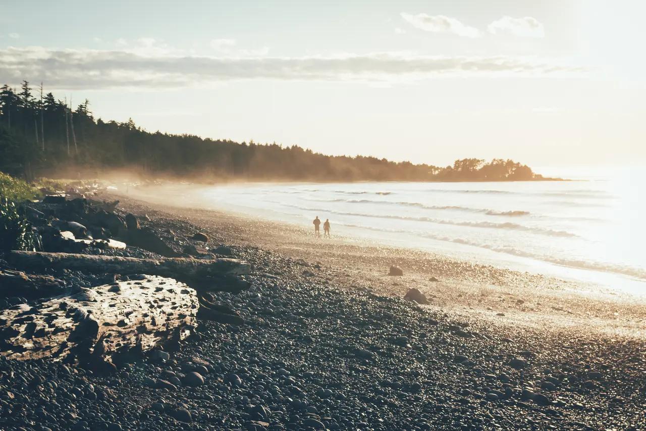 Hero scene that establishes the article’s promise: a quiet, wild stretch of Vancouver Island’s west coast that feels ‘secret’—the kind of coastline you reach by driving the Juan de Fuca route between Sooke and Port Renfrew, not a resort strip.