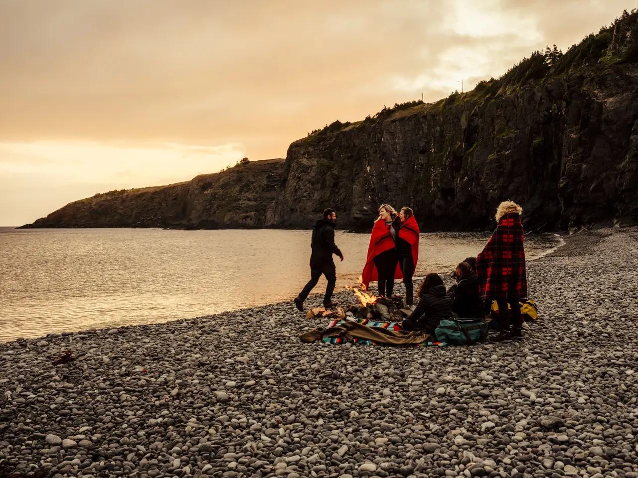 Middle Cove Beach as the article’s ‘campfire-and-seasonal-wildlife’ beach—supporting the narrative of dramatic Atlantic coastline near St. John’s, with space for fire pits and seasonal moments like icebergs or capelin roll.