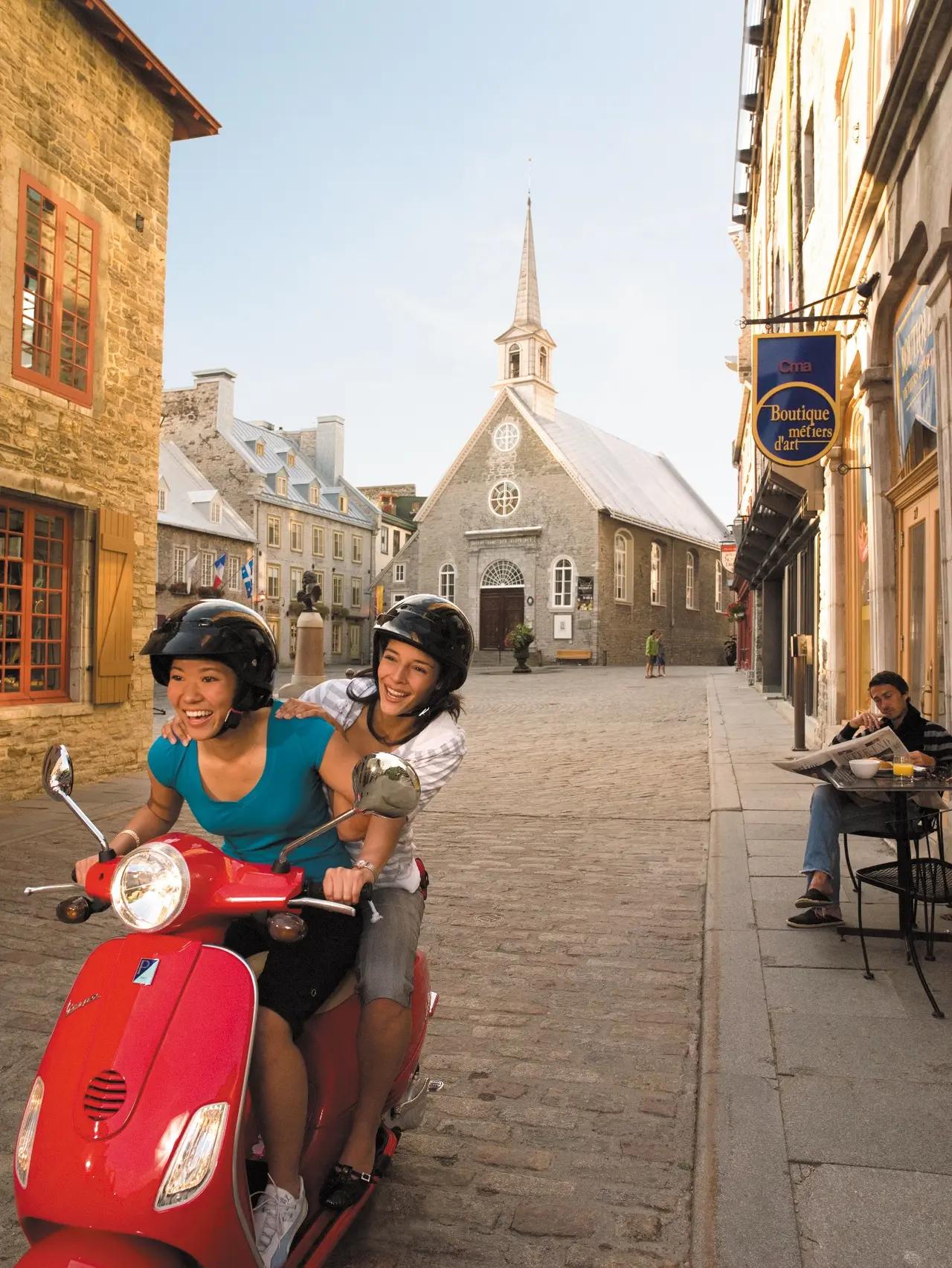Represents the King’s Road section by showing the feel of Quebec’s historic urban core—cobblestones and heritage streets that make this route a city-to-city history drive rather than a remote nature loop.