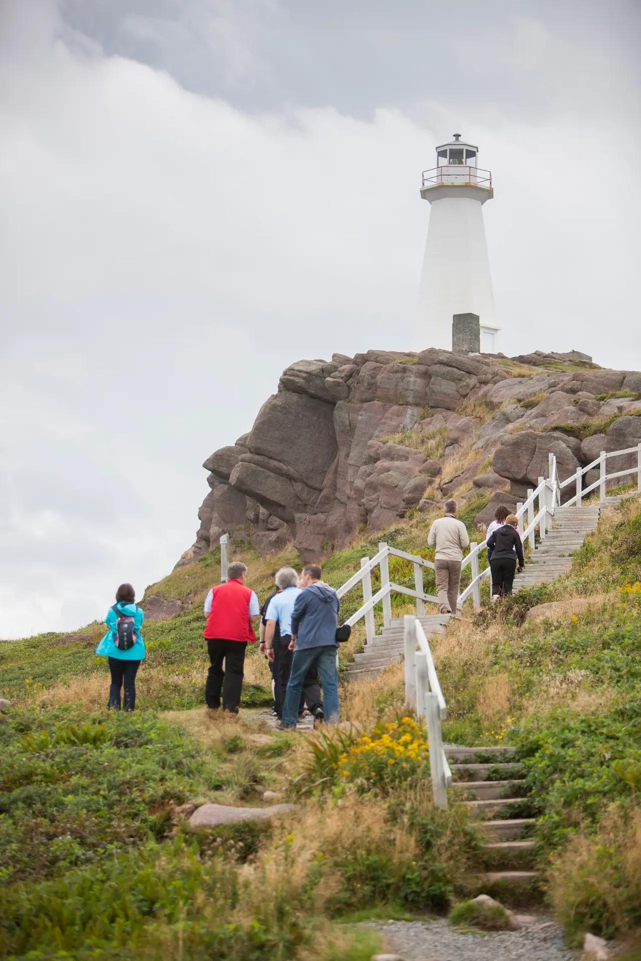 Anchors the ‘easternmost point’ claim with a lighthouse landmark that helps travelers understand geography (edge-of-the-country feeling) and whale/iceberg watching potential.