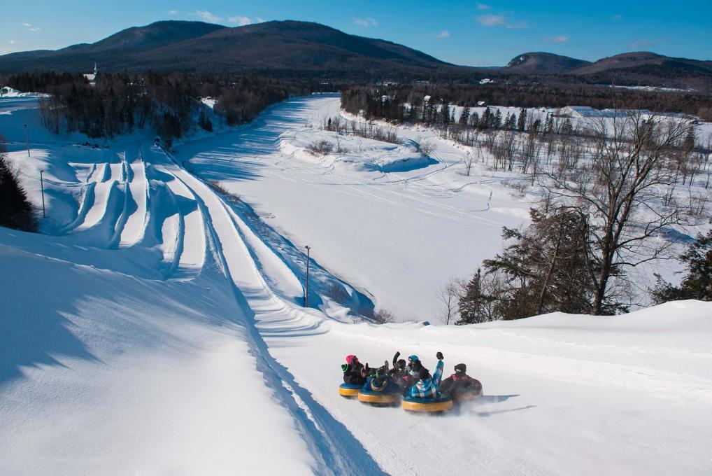 people snowtubing in Quebec