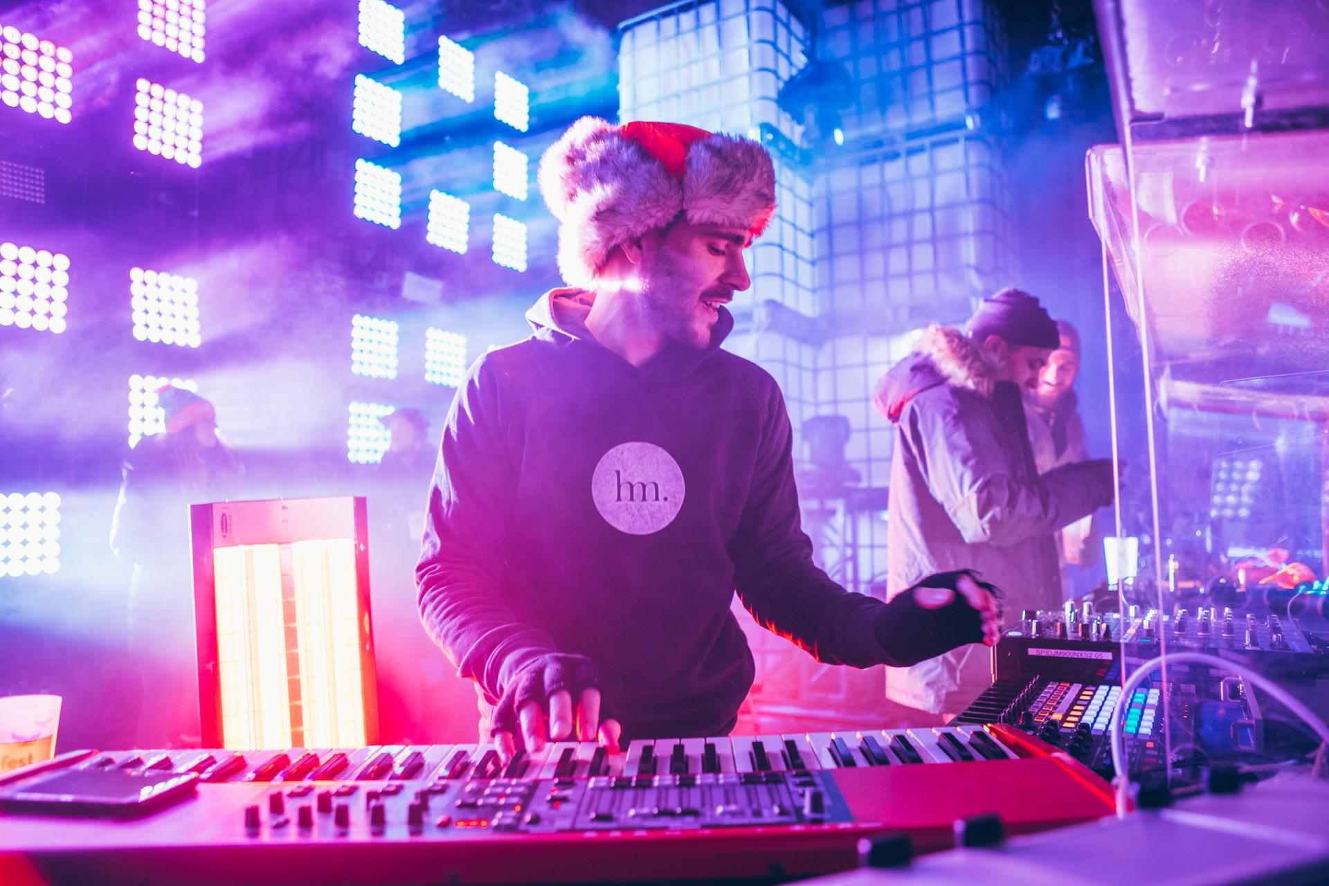 a DJ performing at outdoor music festival Igloofest.