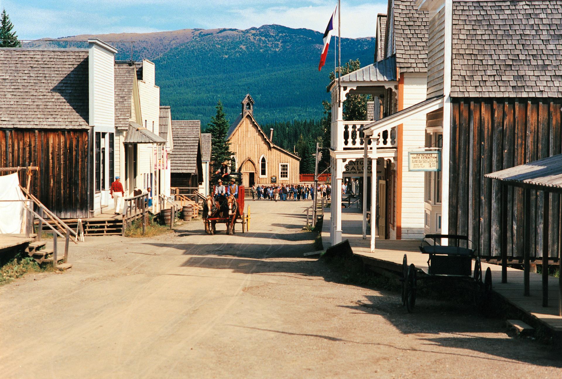 people in a horse and buggy at barkerville historic site