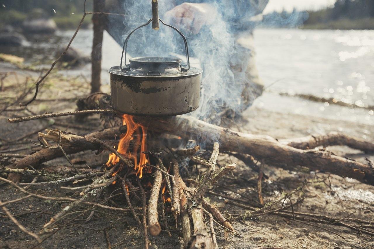 Cooking over campfire