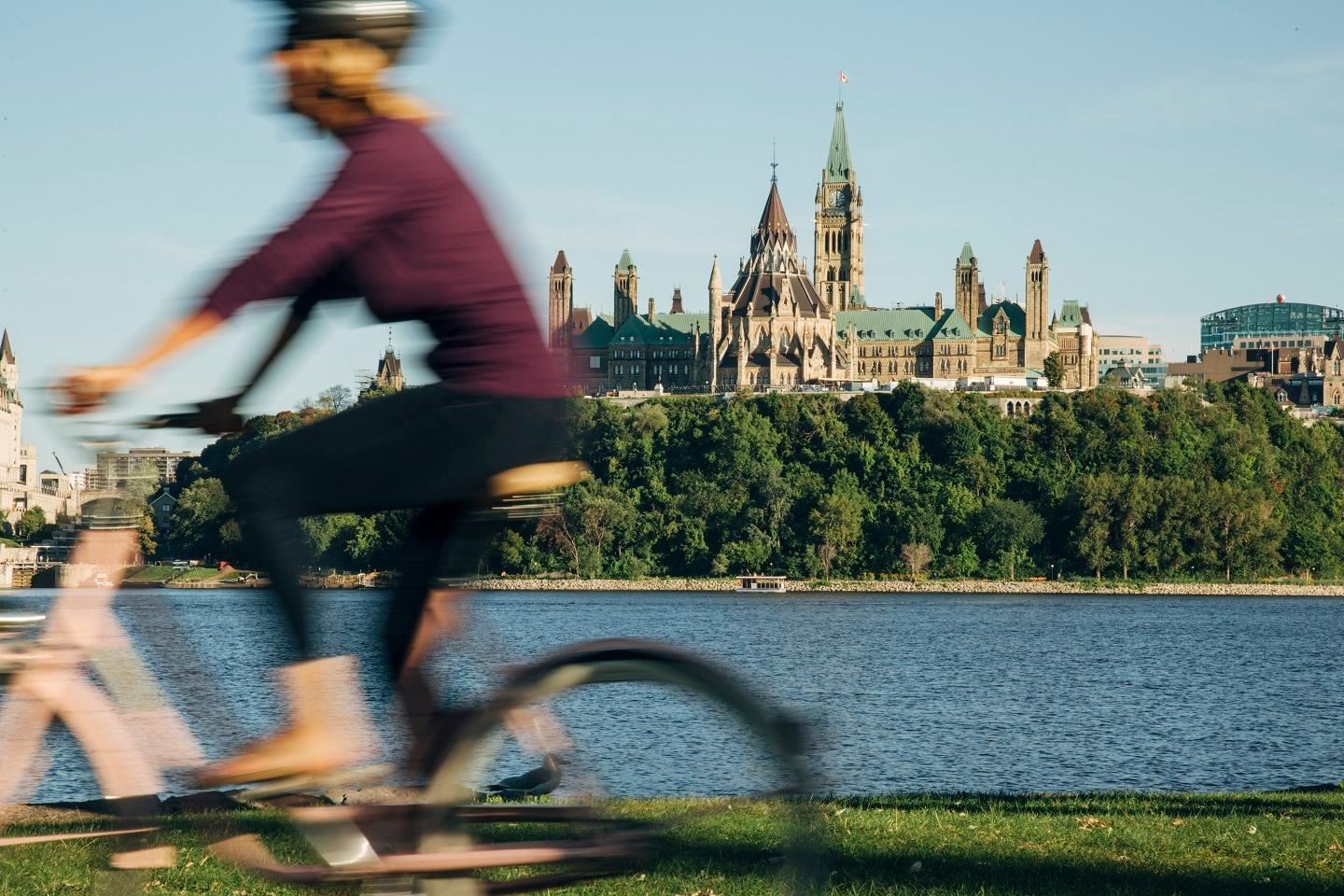 Cycling along the Ottawa River near Parliament