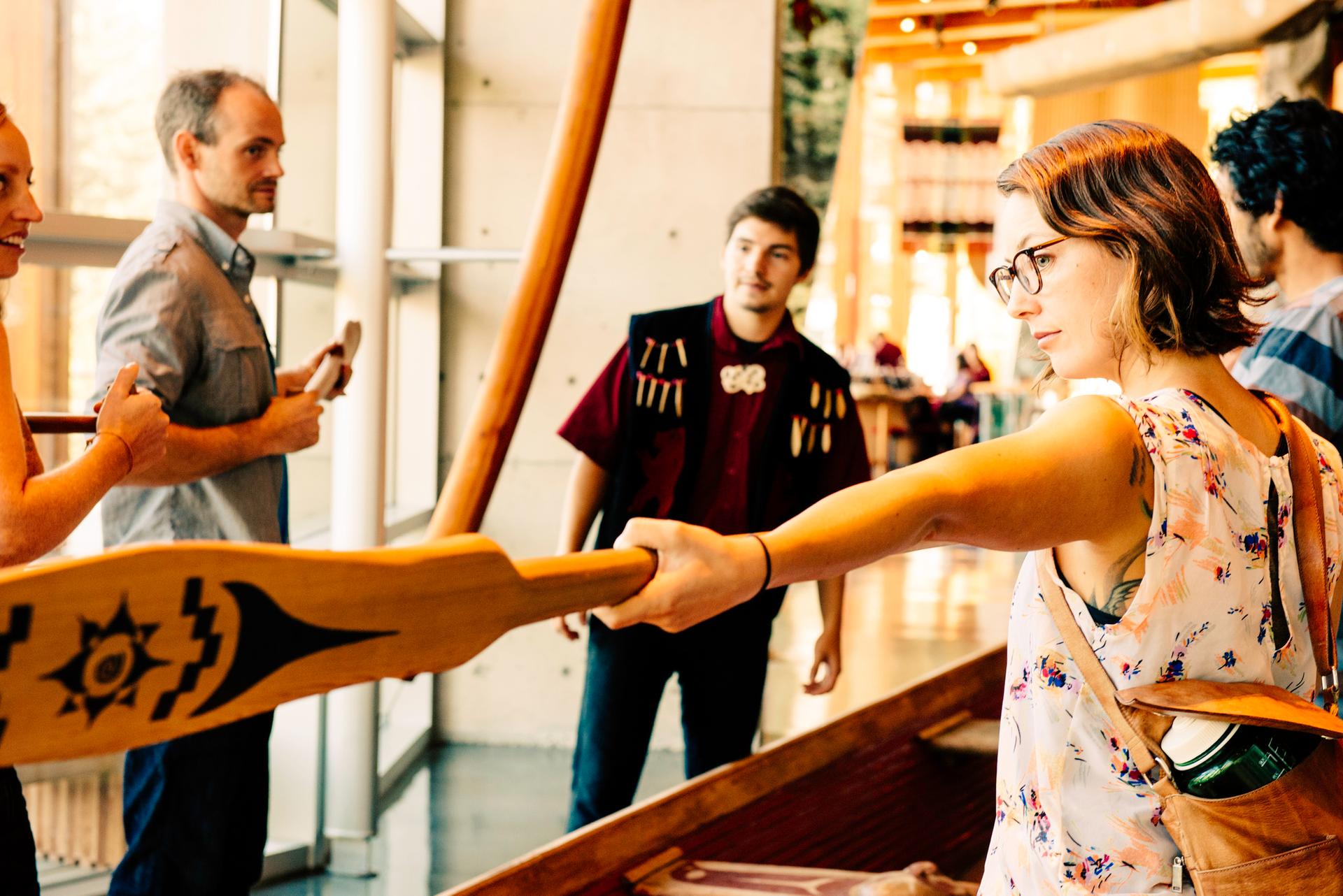 Visitors explore Squamish Lil'wat Cultural Centre in Whistler