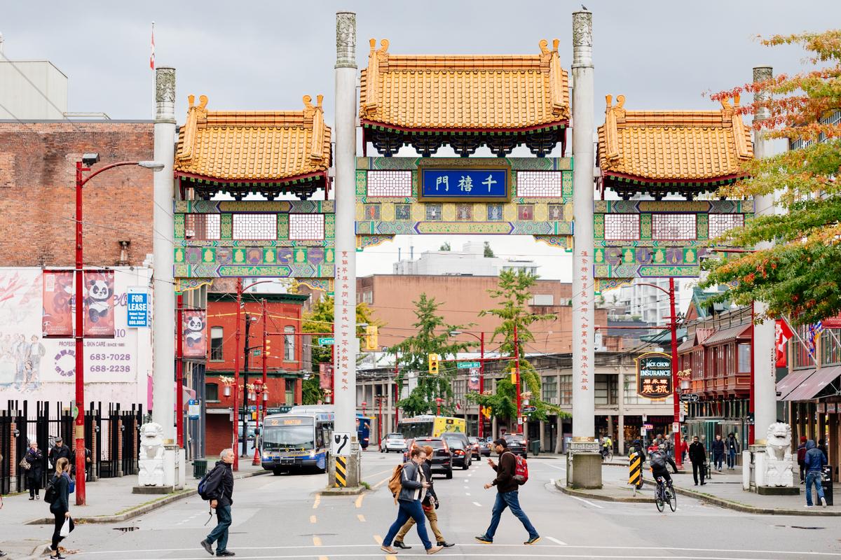 Photo of people walking through Chinatown in Vancouver, BC
