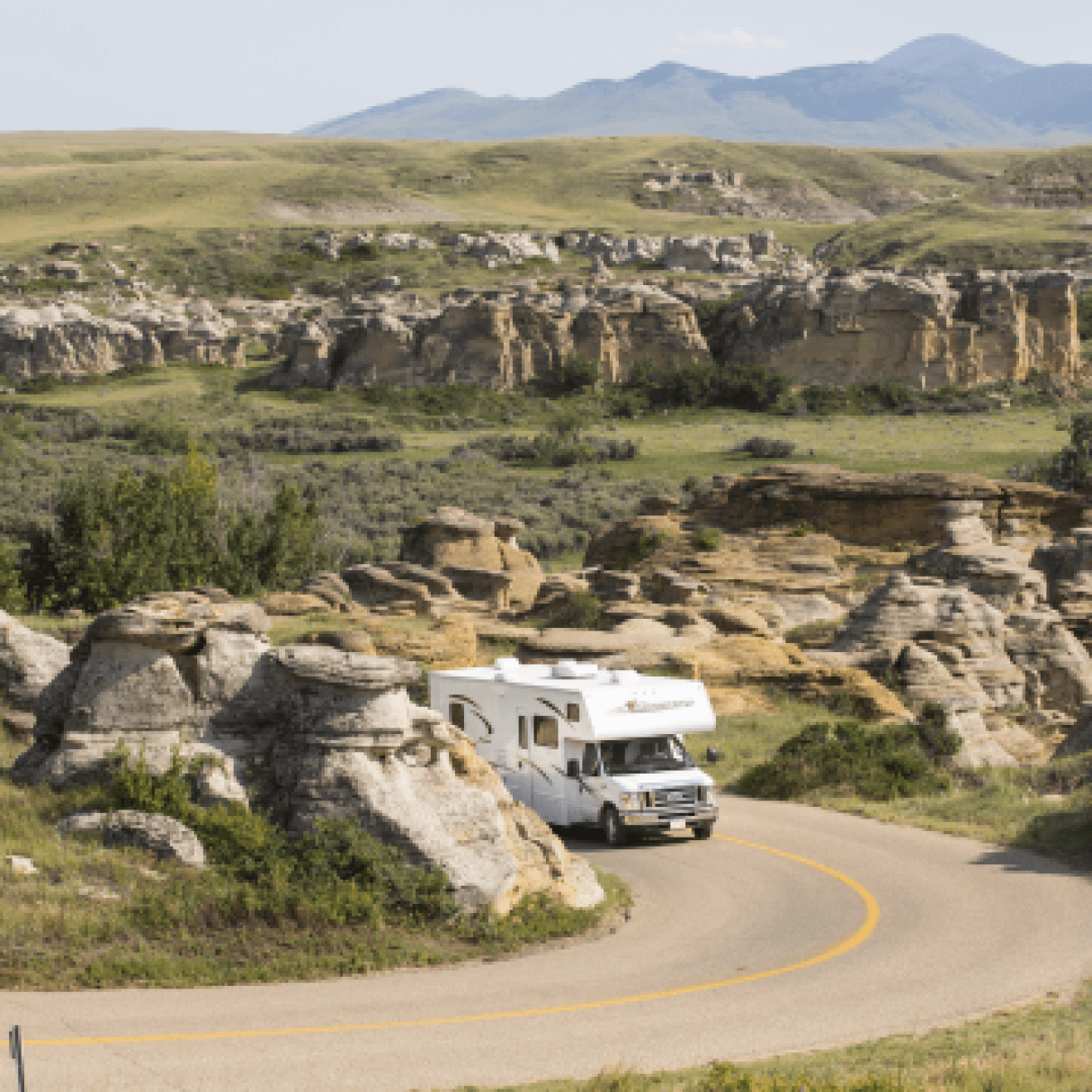 An RV rounds a corner at Writing on Stone provincial park in Alberta