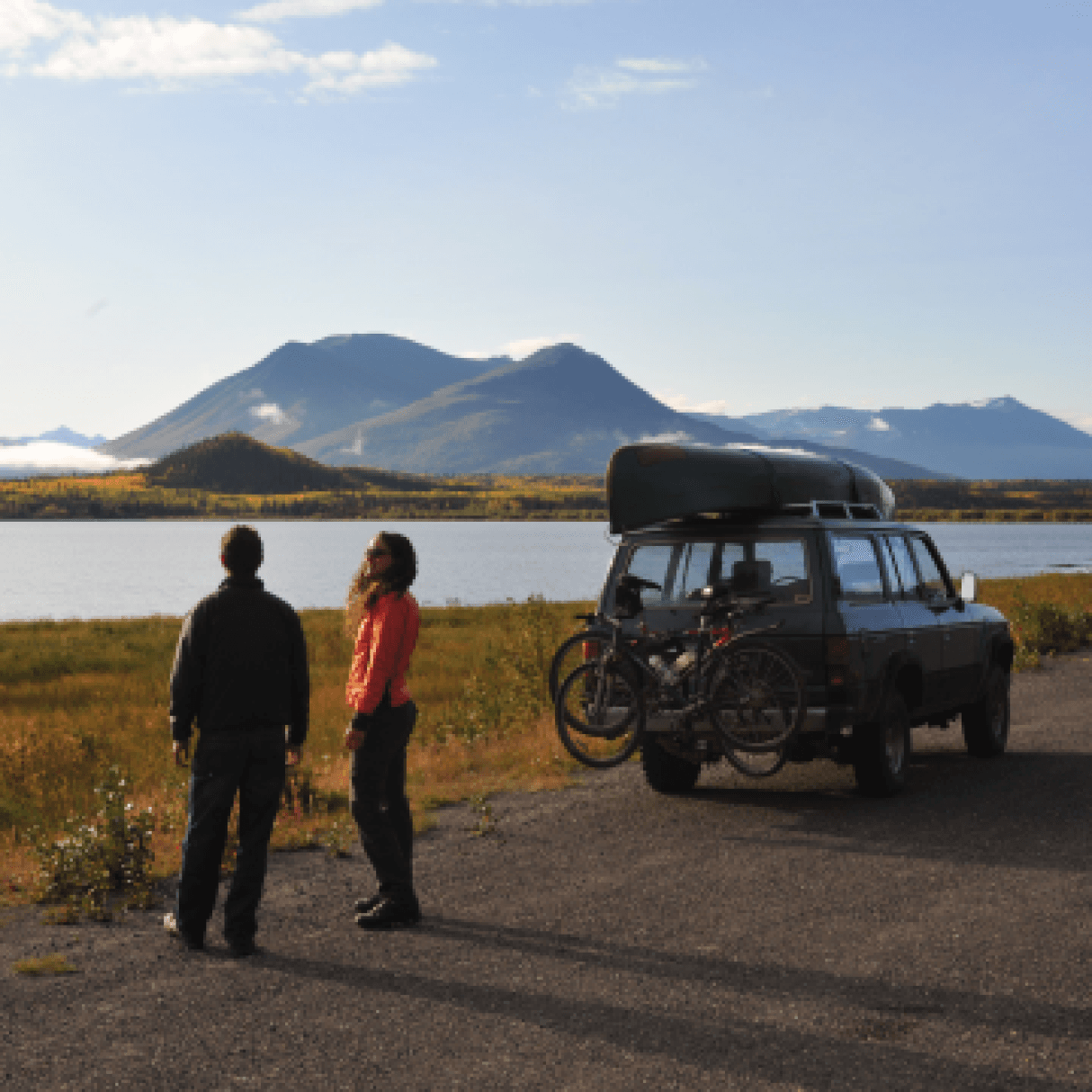 A van parked alongside Dezadeash Lake in the Yukon