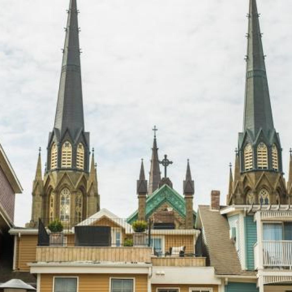 Two church steeples visible above street level in Charlottetown, PEI