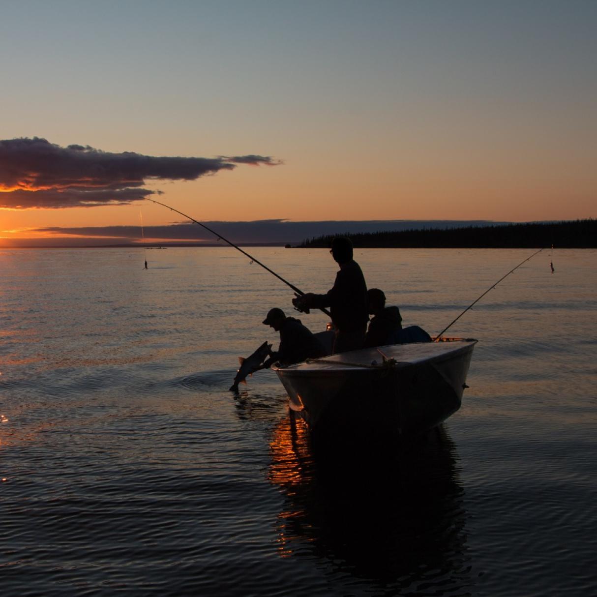 Two people fishing on Great Slave Lake