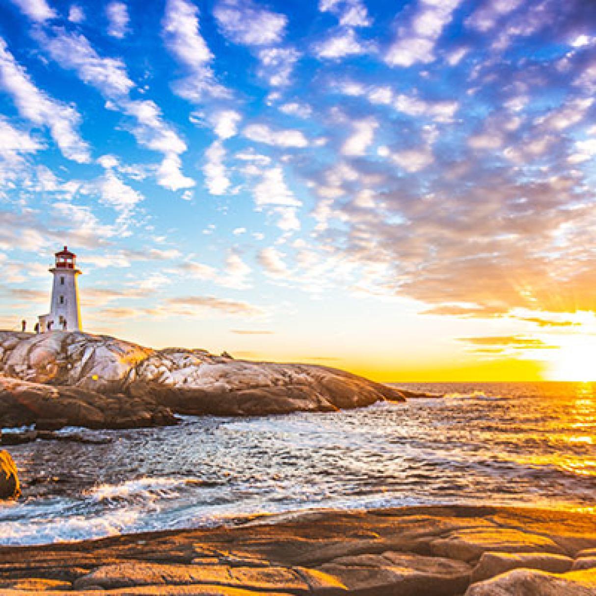 Scenic view of the lighthouse in Peggy's Cove, Nova Scotia in Atlantic Canada in the summer evening
