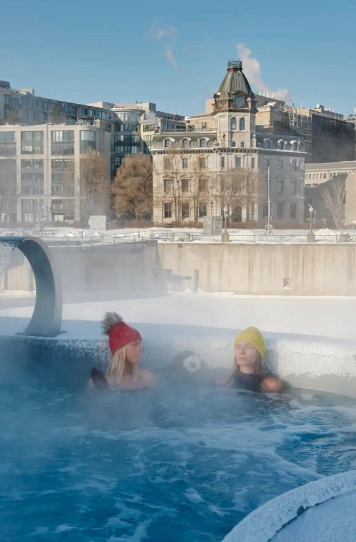 People keeping warm in a hot tub in Montreal